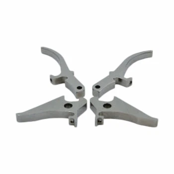 Pièces de moulage par injection de poudre métallique